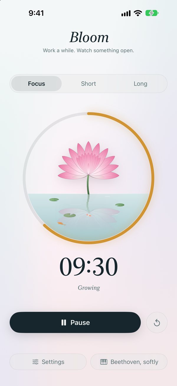 Bloom's timer: a pink lotus half open above a small pond inside a gold progress ring, with 09:30 left.